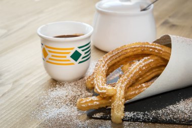 Churros sıcak çikolata ve şeker ile