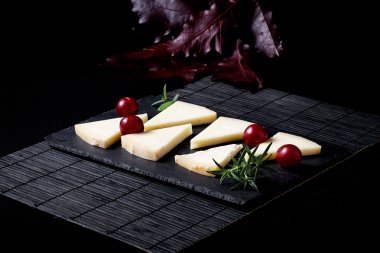 Typical Spanish cheese with wine, grapes and cherry tomatoes