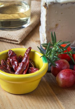 Typical Spanish cheese with wine, grapes and cherry tomatoes