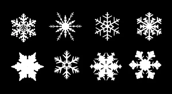 Collection de flocons de neige isolés — Image vectorielle