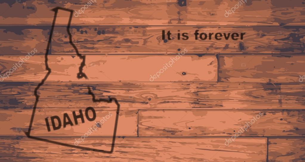 Idaho state map brand on wooden boards with map outline and state motto
