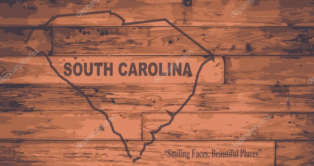 South Carolina state map brand on wooden boards with map outline and state motto