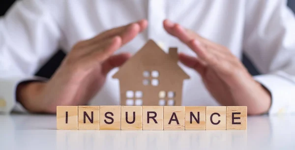 Male Insurance Agent Using Hand Protect Home Home Insurance House — Stock Photo, Image