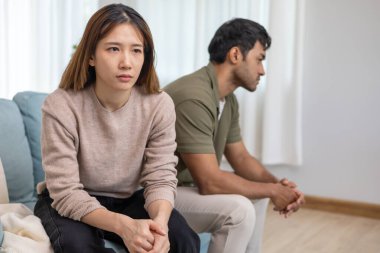 Divorce. Asian couples are desperate and disappointed after marriage. Husband and wife are sad, upset and frustrated after quarrels. distrust, love problems, betrayals. family problem, teenage lov