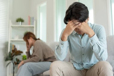 Divorce. Asian couples are desperate and disappointed after marriage. Husband and wife are sad, upset and frustrated after quarrels. distrust, love problems, betrayals. family problem, teenage lov