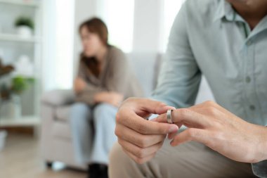 Quarrel, Divorce. husband and wife remove married ring. Couples desperate and disappoint after marriage. Divorce document, upset and frustrated after conflict. distrust, love problems, betrayals
