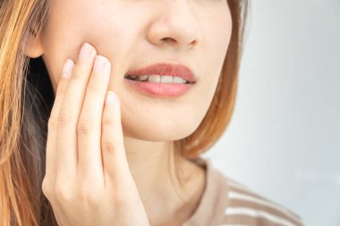 Asian woman feel toothache from gingivitis, female suffer tooth, decay problems, dental care. sensitive tooth, decay problem, bad breath, Gingival Recession, Oral Hygiene instruction, tooth extraction