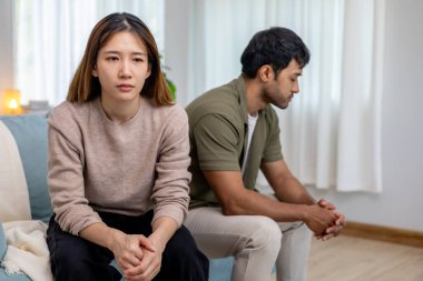 Divorce. Asian couples are desperate and disappointed after marriage. Husband and wife are sad, upset and frustrated after quarrels. distrust, love problems, betrayals. family problem, teenage lov