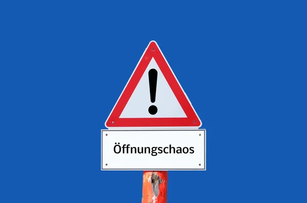 Znak Ostrzegawczy Otwierający Chaos Niebieskim Tle Języku Niemieckim — Zdjęcie stockowe