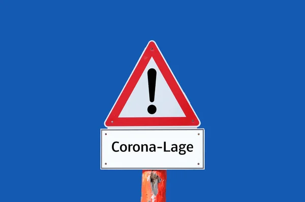 Warnschild Corona Situation Auf Blauem Hintergrund — Stockfoto