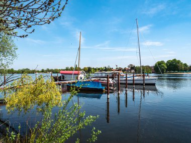 Harbor with boats in Werder on the Havel clipart