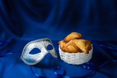 Purim, karnaval maskesi ve hamantaschen Yahudi tatil