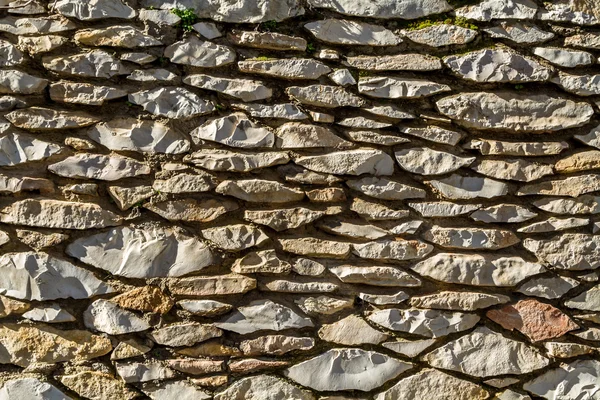 Steenwerk, fragment van een muur — Stockfoto