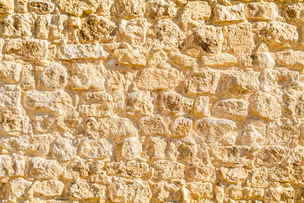 Obra de pedra antiga, fragmento de uma parede — Fotografia de Stock