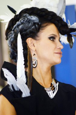 Intercharm XXI International Perfumery and Cosmetics Exhibition Young woman with glamorous hair