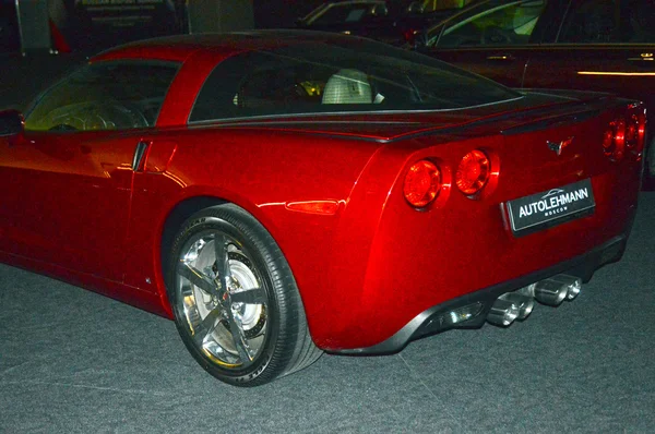 Red Corvette in the showroom — Stock Photo, Image