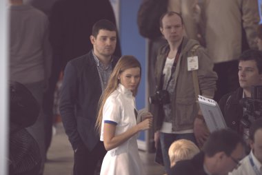 Fotoğraf Expo-2015. Moskova katılımcı ve ziyaretçi ve kızlar promo modelleri