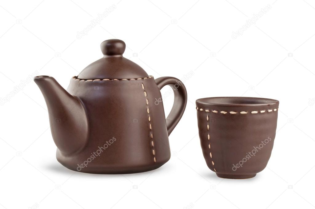 brown teapot and cup