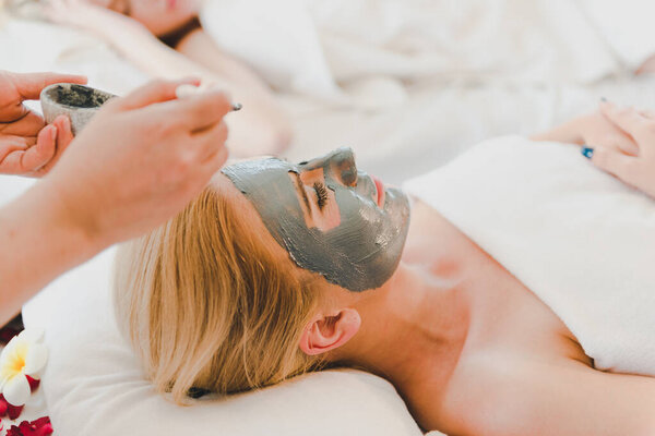 Young Woman Using Black Mud Mask Spa Facial Treatment Spa Stock Picture