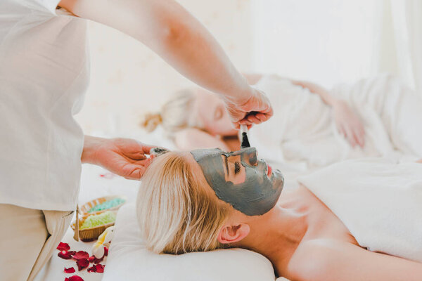 Young Woman Using Black Mud Mask Spa Facial Treatment Spa Stock Photo