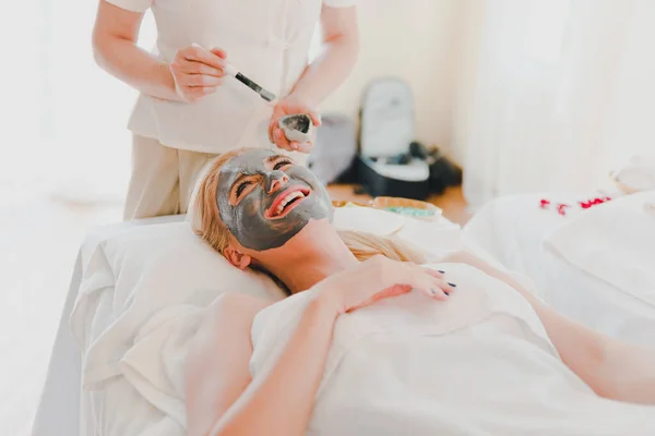 Young Woman Using Black Mud Mask Spa Facial Treatment Spa Stock Image