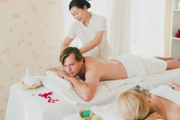 Young Man Doing Back Massage Female Spa Staff Gave Him Royalty Free Stock Images