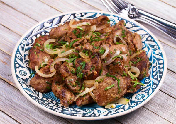 Sauteed chicken liver with apple and onion — Stock Photo, Image