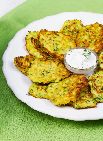 Zucchini Pancakes With  Sour Cream in White Plate — Stock Photo, Image