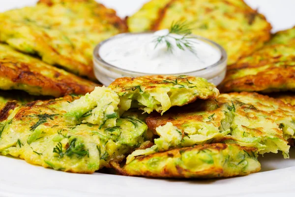 Zucchini Pancakes With  Sour Cream in White Plate — Stock Photo, Image