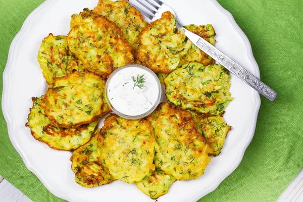 Zucchini Pancakes With  Sour Cream in White Plate — Stock Photo, Image