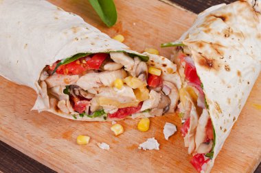 Chicken and vegetable burrito clipart