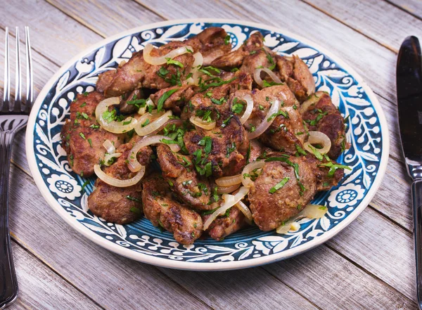 Sauteed chicken liver with apple and onion — Stock Photo, Image