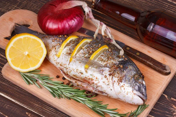 Fresh dorado on a cutting board — Stock Photo, Image