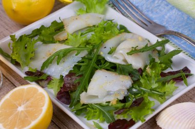 White fish, toothfish with salad clipart