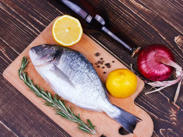 Fresh dorado on a cutting board — Stock Photo, Image