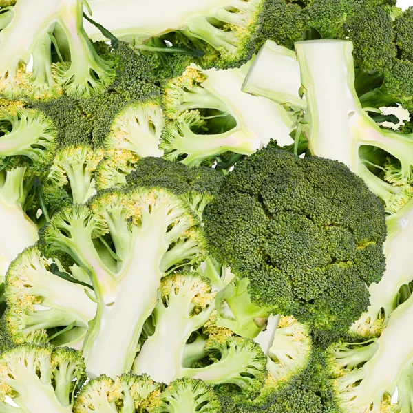 Abstracte achtergrond met segmenten van broccoli. Naadloze patroon voor ontwerp. Close-up. Studiofotografie — Stockfoto