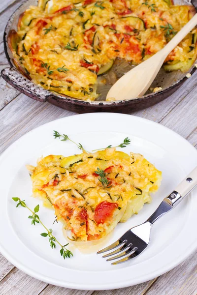 Baked Tomatoes, Zucchini and Potatoes with Thyme and Parmesan Cheese