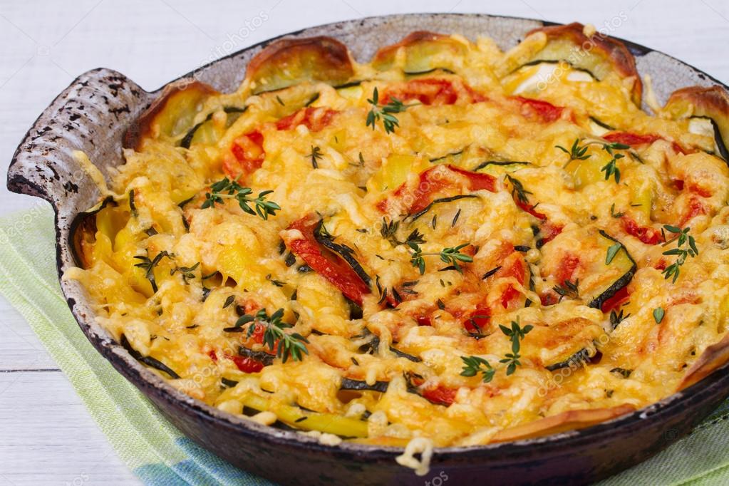 Baked Tomatoes, Zucchini and Potatoes with Thyme and Parmesan Cheese