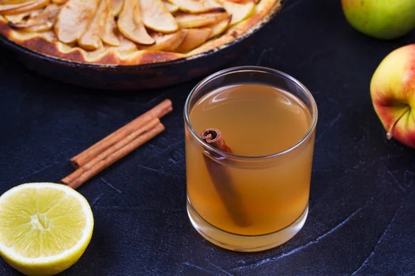 Glass of cider, apples and lemon — Stock Photo, Image
