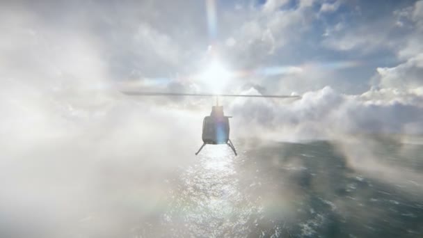 Hélicoptère survolant la mer — Video