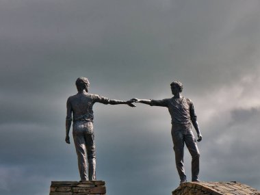 Hands Across the Divide - a sculpture on the western side of the Craigavon Bridge in Derry / Londonderry, Northern Ireland, symbolising reconciliation after the Troubles.
