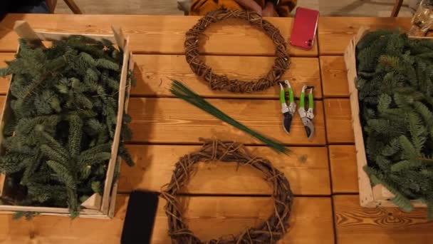 Panorama Wooden Table New Year Decorations Create Wreaths Boxes Scissors — Stock Video