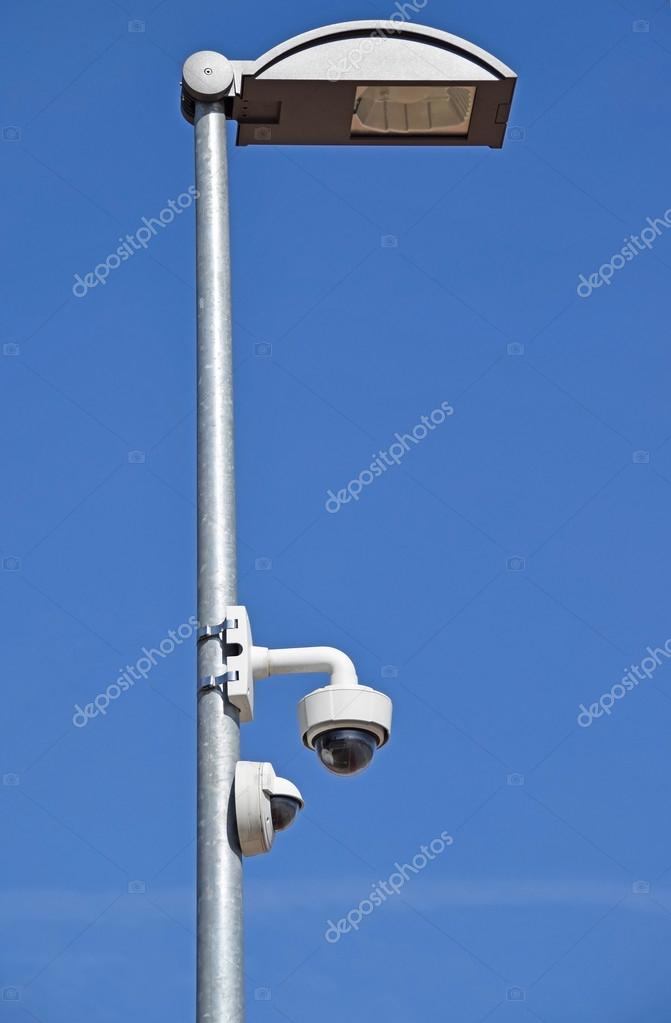 Street light and security camera — Stock Photo © majorosl66 #105715384