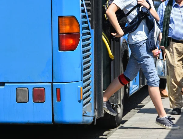 Blue bus at the stop Stock Image