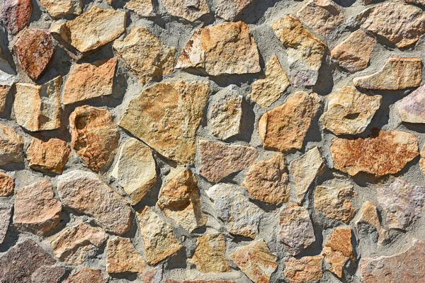 Patrón de un muro de piedra —  Fotos de Stock