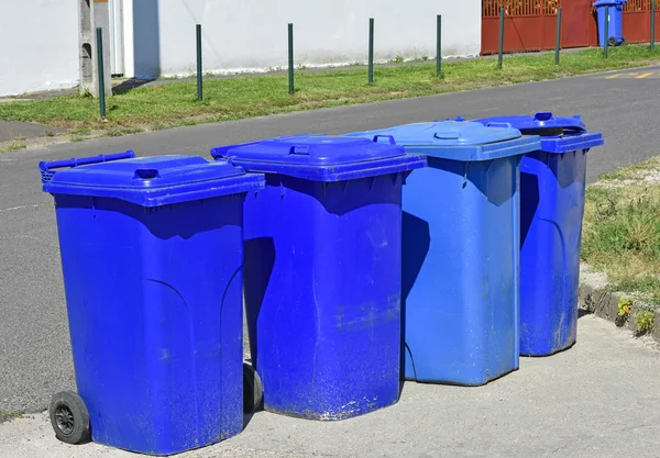 Wheeled garbage cans on the street