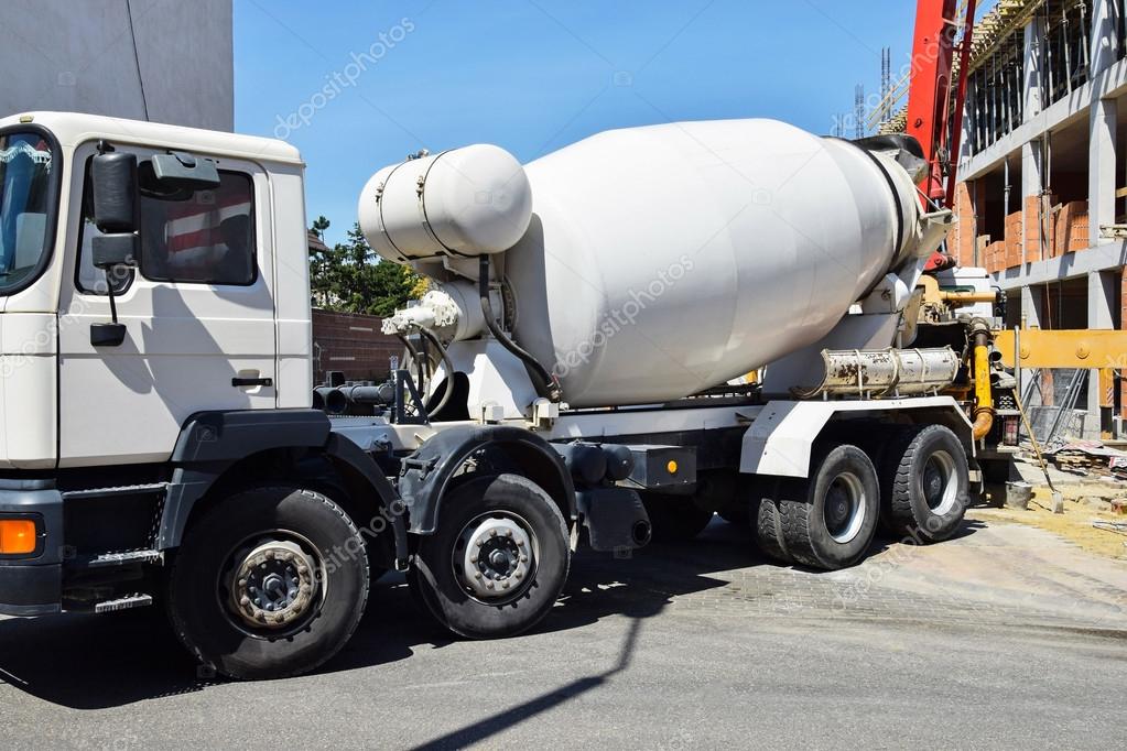 Cement mixer truck at the construction site — Stock Photo © majorosl66