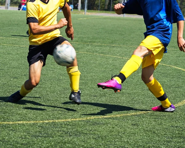Soccer players in action — Stock Photo, Image