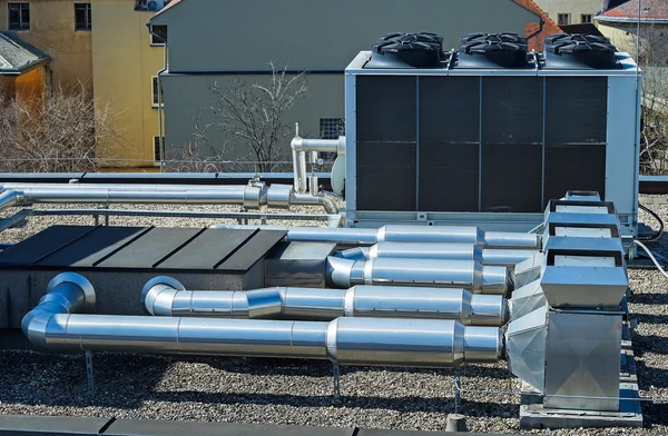 Air conditioner on the top of an office building Stock Photo