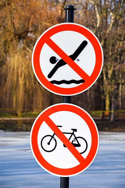 No swimming and cycling road signs — Stock Photo, Image